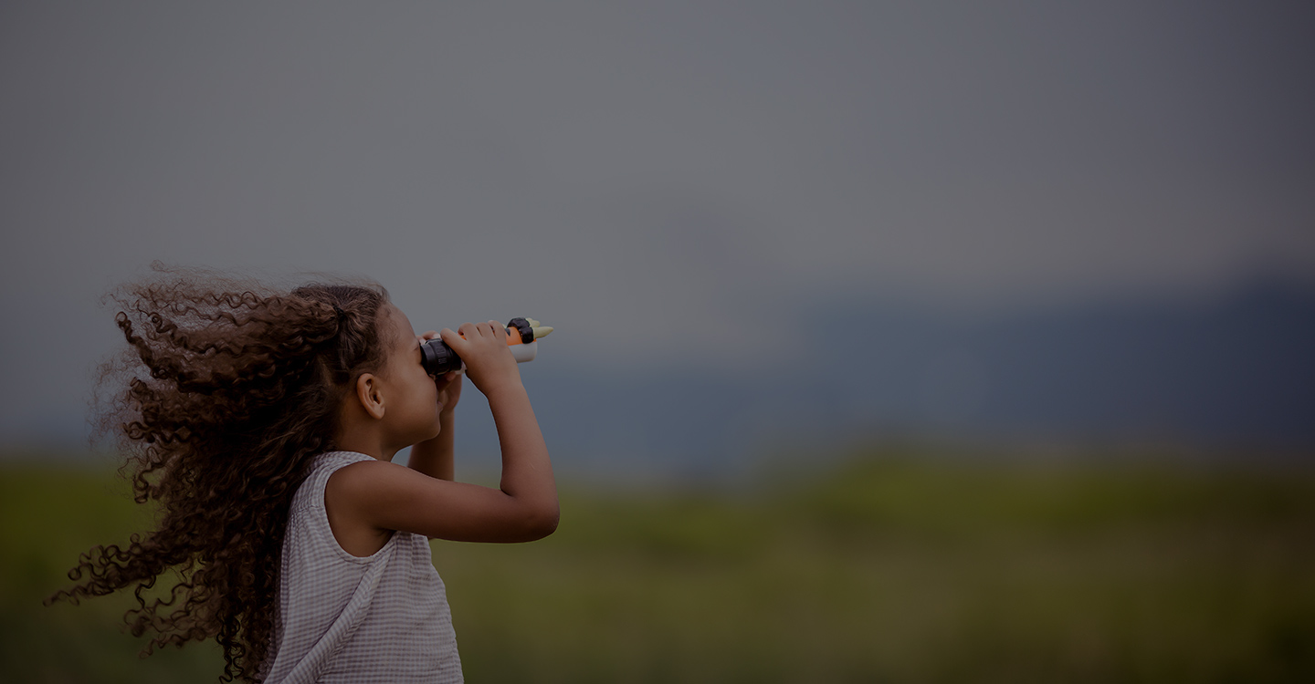 Young girl with binoculars